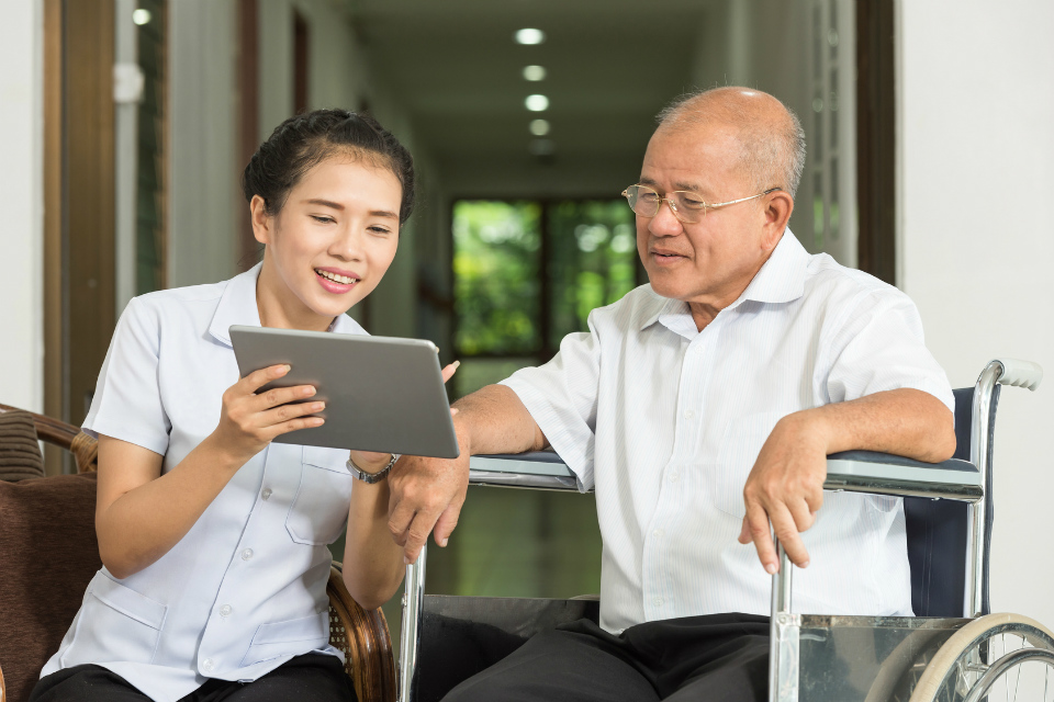 Nurse caring for a Chinese man